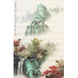 A 20TH CENTURY MOUNTED & GLAZED CHINESE PAINTING ON PAPER OF A MOUNTAINOUS LANDSCAPE SCENE, the