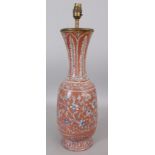 AN ISNIK STYLE CERAMIC VASE, converted to a lamp, decorated with scrolling foliage reserved on an