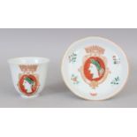 AN UNUSUAL CHINESE FAMILLE ROSE EUROPEAN SUBJECT PORCELAIN CUP & SAUCER, each piece with a crowned