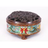 A CHINESE CHAMPLEVE CIRCULAR BOX & PIERCED BRONZE COVER, 4in diameter & 2.3in high overall.