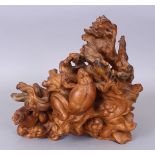 A GOOD QUALITY 19TH/20TH CENTURY CHINESE ROOTWOOD CARVING, pierced and carved with a group of