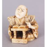 A GOOD QUALITY SIGNED JAPANESE MEIJI PERIOD IVORY NETSUKE OF A SEATED SCHOLAR, with a grimacing