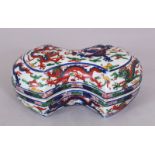 A CHINESE WANLI STYLE WUCAI SHAPED PORCELAIN DRAGON BOX & COVER, the base with an extended six-