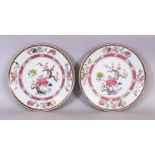 A PAIR OF GOOD QUALITY CHINESE YONGZHENG PERIOD FAMILLE ROSE PORCELAIN PLATES, each painted to its