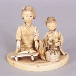 A SIGNED JAPANESE MEIJI PERIOD SECTIONAL IVORY OKIMONO OF A FISH VENDOR & HER DAUGHTER, the base