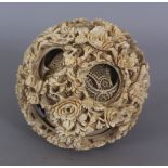 A LARGE 19TH CENTURY CHINESE CARVED IVORY CONCENTRIC BALL, weighing approx. 377gm, the outer