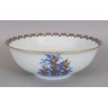 AN EARLY/MID 20TH CENTURY JAPANESE FUKAGAWA PORCELAIN BOWL, decorated with clusters of ferns, the