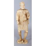 A LARGE SIGNED JAPANESE MEIJI PERIOD SECTIONAL IVORY OKIMONO OF A STANDING FARMER, 12.7in high.