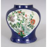 A CHINESE FAMILLE VERTE POWDER BLUE GROUND PORCELAIN VASE, circa 1900, 4.6in high.