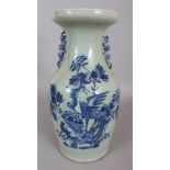 A 19TH CENTURY CHINESE BLUE & WHITE CELADON GROUND PORCELAIN PHOENIX VASE, painted with a phoenix