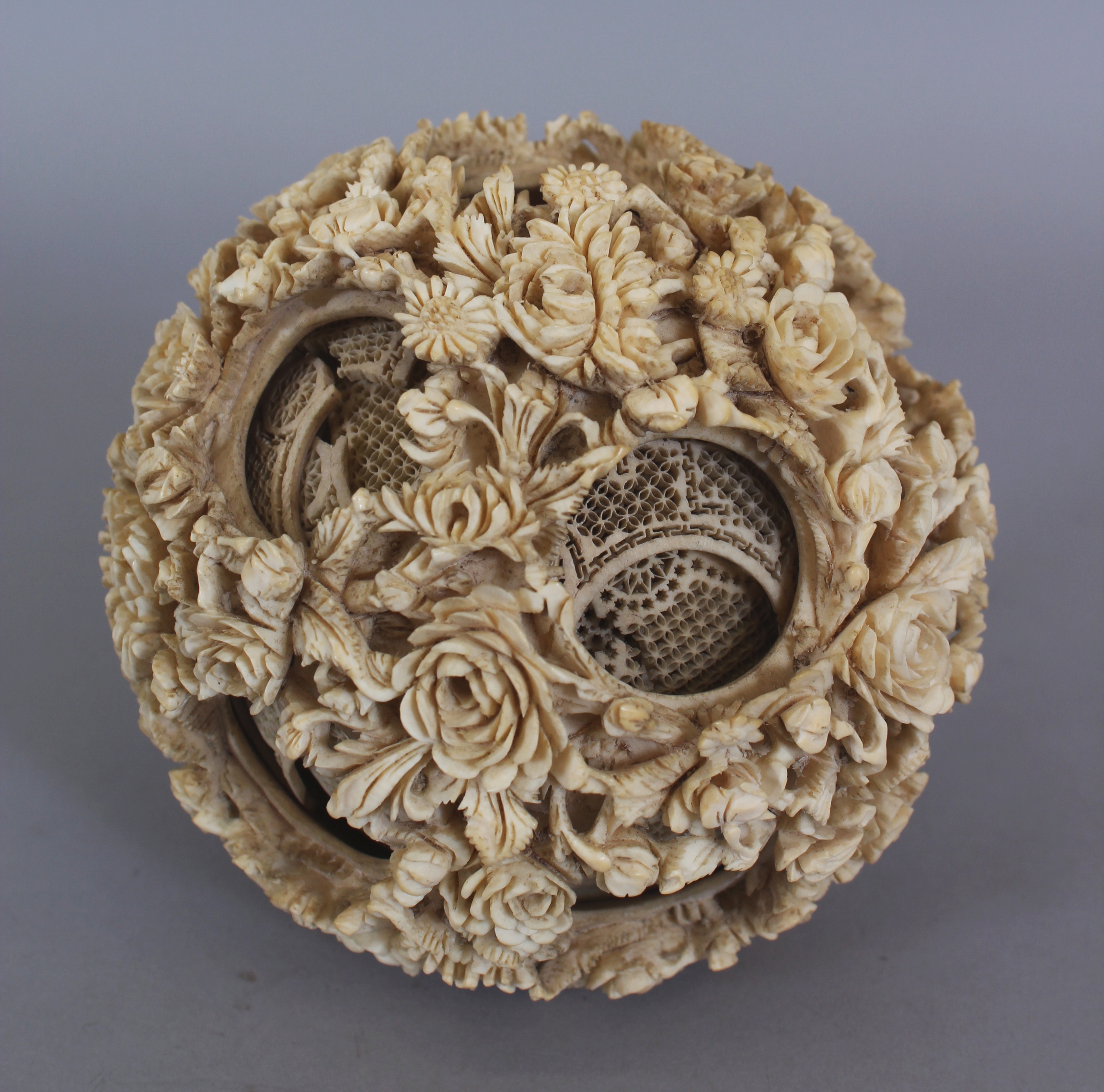 A LARGE 19TH CENTURY CHINESE CARVED IVORY CONCENTRIC BALL, weighing approx. 377gm, the outer - Image 3 of 6