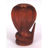 AN UNUSUAL 20TH CENTURY INDIAN WOOD CARVING OF A COBRA, 6.25in high.