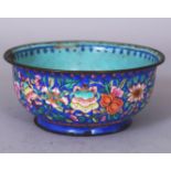 A GOOD QUALITY EARLY 19TH CENTURY CHINESE CANTON ENAMEL BOWL, the sides decorated with a profusion