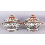 A GOOD PAIR OF EARLY/MID 19TH CENTURY CHINESE CANTON FAMILLE ROSE PORCELAIN TUREENS & COVERS, the