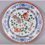 A GOOD CHINESE YONGZHENG PERIOD FAMILLE ROSE PORCELAIN PLATE, circa 1730, painted to its centre with