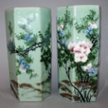 A PAIR OF EARLY 20TH CENTURY JAPANESE CELADON GROUND PORCELAIN VASES, the sides of each hexagonal-