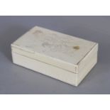 A JAPANESE MEIJI PERIOD RECTANGULAR IVORY BOX & COVER, weighing approx. 92gm, the cover well