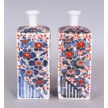 A SMALL PAIR OF LATE 19TH CENTURY JAPANESE IMARI PORCELAIN TOKKURI, each square section body painted