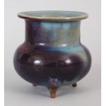 A CHINESE SONG STYLE RU WARE PURPLE SPLASH PORCELAIN TRIPOD CENSER, 3.7in diameter at rim & 4.1in