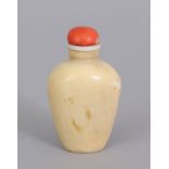 A SMALL GOOD QUALITY 19TH CENTURY CHINESE IVORY SNUFF BOTTLE & CORAL STOPPER, the bottle of