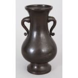 A SMALL CHINESE SHISOU STYLE WIRE INLAID BRONZE VASE, 4.7in high.