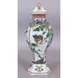 A 19TH CENTURY SAMSON KANGXI STYLE FAMILLE VERTE HEXAGONAL SECTION PORCELAIN VASE & COVER, 12.25in