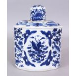 A 19TH CENTURY CHINESE BLUE & WHITE PORCELAIN TEA CADDY & COVER, of shaped oval section, the sides