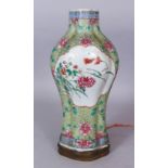 A GOOD QUALITY 19TH CENTURY CHINESE FAMILLE ROSE PORCELAIN VASE, fitted for electricity, 11.5in high