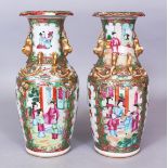 A PAIR OF 19TH CENTURY CHINESE CANTON PORCELAIN VASES, each painted in typical palette with