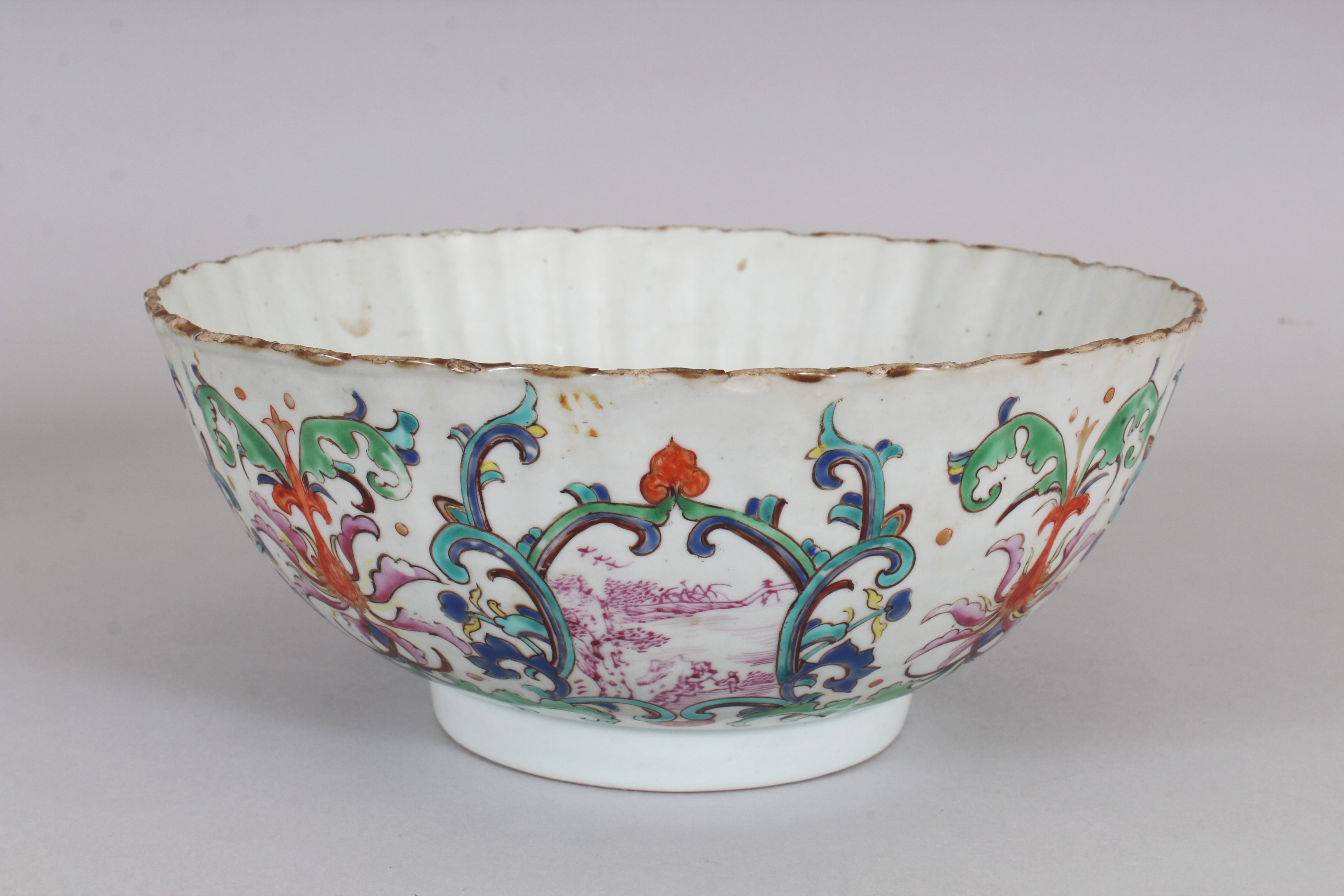 AN UNUSUAL EARLY 18TH CENTURY CHINESE FAMILLE ROSE FLUTED PORCELAIN BOWL, painted with formal - Image 2 of 8