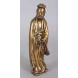 AN 18TH/19TH CENTURY CHINESE POLISHED BRONZE FIGURE OF A STANDING IMMORTAL, the flowing robes with