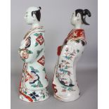 A LARGE PAIR OF 18TH CENTURY JAPANESE IMARI EDO PERIOD PORCELAIN FIGURES, of a standing gentleman