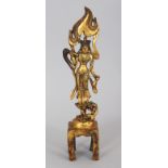 A GOOD QUALITY CHINESE NORTHERN WEI STYLE GILT BRONZE FIGURE OF A BUDDHIST DEITY, standing on a tall