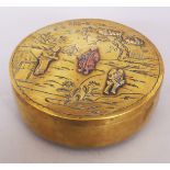 A JAPANESE MEIJI PERIOD MIXED METAL CIRCULAR BOX & COVER, 5.25in diameter.