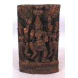 A SIMILAR 20TH CENTURY INDIAN WOOD TEMPLE CARVING, 11.75in high x 7.5in wide.