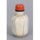 A GOOD 18TH/19TH CENTURY CHINESE IVORY SNUFF BOTTLE & RED CORAL STOPPER, the bottle with numerous