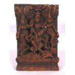 A 20TH CENTURY INDIAN WOOD TEMPLE CARVING, depicting a group of deities and animals, 12in high x 8in