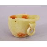 A SMALL 19TH/20TH CENTURY CHINESE JADE RHYTON LIBATION CUP, with a loose ring handle, the pale