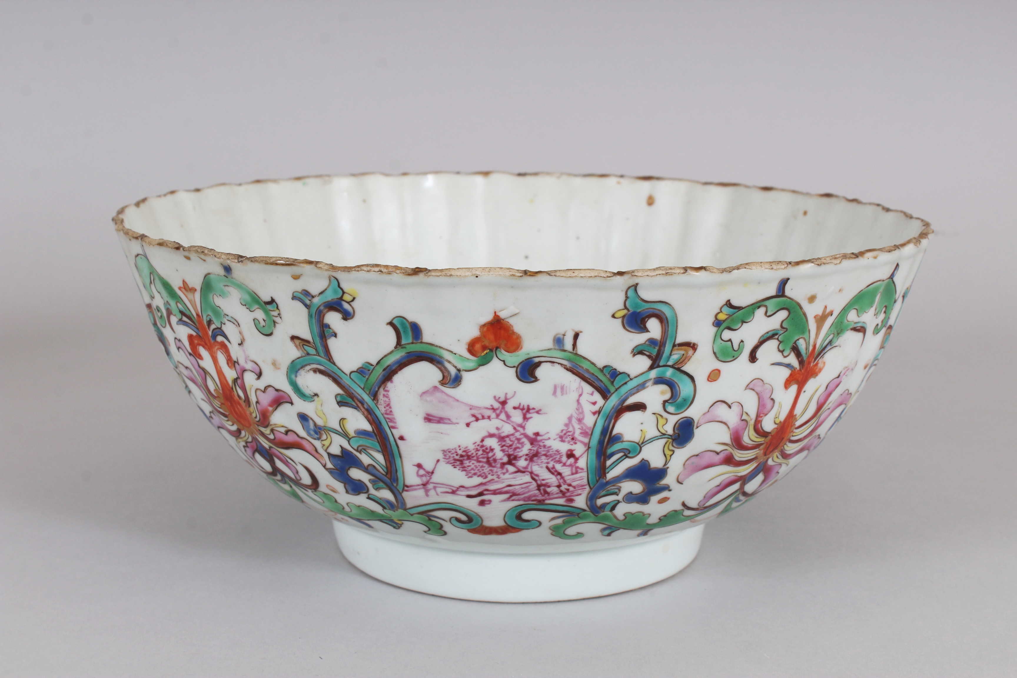 AN UNUSUAL EARLY 18TH CENTURY CHINESE FAMILLE ROSE FLUTED PORCELAIN BOWL, painted with formal - Image 4 of 8