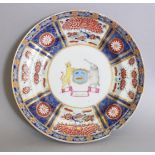 AN UNUSUAL 18TH/19TH CENTURY CHINESE ARMORIAL PORCELAIN SAUCER DISH, possibly for the Indian or