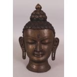 A 20TH CENTURY THAI BRONZE HEAD OF BUDDHA, 11.75in high.