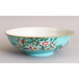 AN 18TH CENTURY CHINESE QIANLONG MARK & PERIOD TURQUOISE GROUND FAMILLE ROSE PORCELAIN BOWL, the