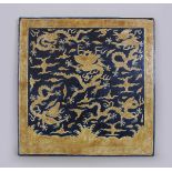 AN UNUSUAL LARGE CHINESE MING STYLE YELLOW & BLUE PORCELAIN TILE, with incised decoration of dragons