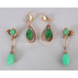 TWO PAIRS OF CHINESE APPLE GREEN JADE OR HARDSTONE EARRINGS, with gilt-metal fittings.