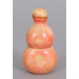 AN UNUSUAL 19TH CENTURY STAINED IVORY DOUBLE GOURD SNUFF BOTTLE & STOPPER, the ivory with a good