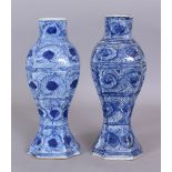 A PAIR OF CHINESE KANGXI PERIOD DUTCH MARKET BLUE & WHITE PORCELAIN VASES, circa 1700, of