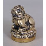 A 20TH CENTURY CHINESE BRASS BUDDHISTIC LION SEAL, 2.25in high.