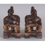 A MIRROR PAIR OF GOOD QUALITY 19TH CENTURY CHINESE SOAPSTONE CARVINGS, each in the form of two