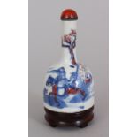 A GOOD QUALITY 19TH CENTURY CHINESE COPPER-RED & UNDERGLAZE-BLUE PORCELAIN SNUFF BOTTLE &