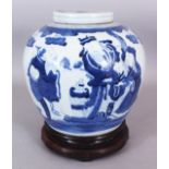 A CHINESE BLUE & WHITE PORCELAIN JAR & COVER, together with a fitted wood stand, the sides decorated